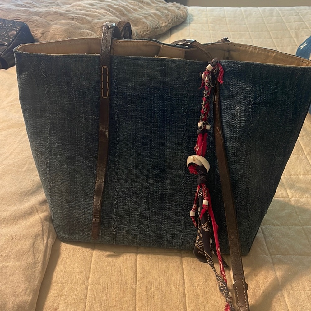 Totem salvaged denim bag with bridal harness strap